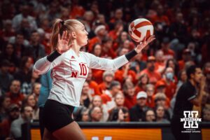 Nebraska Cornhusker libero/defensive specialist Olivia Mauch (10) serves the ball against the Indiana Hoosiers during a college volleyball game on Nov 16, 2024 in Lincoln, Nebraska. Photo by Logan Hock