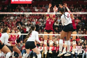 Nebraska Cornhusker outside hitter Taylor Landfair (12) spikes the ball against the Indiana Hoosiers during a college volleyball game on Nov 16, 2024 in Lincoln, Nebraska. Photo by Logan Hock.