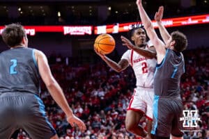 Nebraska Cornhuskers guard Ahron Ulis (2) makes a layup against North Florida Ospreys forward Liam Murphy (7) in the second half during a college basketball game Sunday, December 1, 2024, in Lincoln, Nebraska. Photo by John S. Peterson.