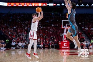 Nebraska Cornhuskers guard Connor Essegian (0) makes a three-point shot against the North Florida Ospreys in the second half during a college basketball game Sunday, December 1, 2024, in Lincoln, Nebraska. Photo by John S. Peterson.