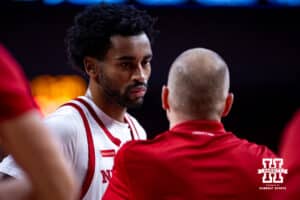 Nebraska Cornhuskers guard Brice Williams (3) listening assistant Nate Loenser in the second half against the North Florida Ospreys during a college basketball game Sunday, December 1, 2024, in Lincoln, Nebraska. Photo by John S. Peterson.