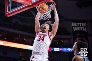 Nebraska Cornhuskers center Braxton Meah (34) makes a dunk against the North Florida Ospreys in the first half during a college basketball game Sunday, December 1, 2024, in Lincoln, Nebraska. Photo by John S. Peterson.