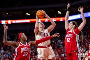 Nebraska Cornhuskers center Alexis Markowski (40) makes a basket against Ohio State Buckeyes center Elsa Lemmila (12) and Cotie McMahon in the fourth quarter during a college basketball game, Sunday, January 26, 2025, in Lincoln, Nebraska. Photo by John S. Peterson.
