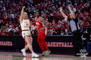 Nebraska Cornhuskers guard Callin Hake (14) celebrates making a three-point shot against Ohio State Buckeyes forward Ajae Petty (1) in the third quarter during a college basketball game, Sunday, January 26, 2025, in Lincoln, Nebraska. Photo by John S. Peterson.