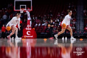 Nebraska Cornhuskers Kendall Moriarty (15) and Callin Hake warm up for Ohio State Buckeyes during a college basketball game, Sunday, January 26, 2025, in Lincoln, Nebraska. Photo by John S. Peterson.
