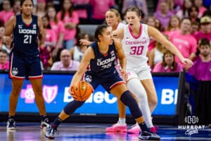 Creighton Bluejays guard Morgan Maly (30) defends against UConn Huskies guard Azzi Fudd (35) in the second half during a college basketball game, Saturday, January 25, 2025, in Omaha, Nebraska. Photo by John S. Peterson.