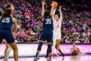 Creighton Bluejays guard Molly Mogensen (21) makes a three-point shot gainst UConn Huskies guard Azzi Fudd (35) in the second half during a college basketball game, Saturday, January 25, 2025, in Omaha, Nebraska. Photo by John S. Peterson.