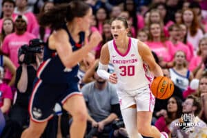 Creighton Bluejays guard Morgan Maly (30) dribbles the ball against the UConn Huskiesin the second half during a college basketball game, Saturday, January 25, 2025, in Omaha, Nebraska. Photo by John S. Peterson.