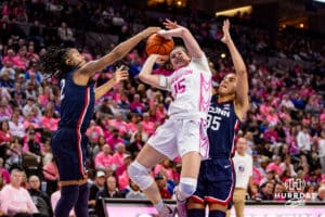 Creighton Bluejays guard Lauren Jensen (15) is blocked by UConn Huskies guard KK Arnold (2) during a college basketball game, Saturday, January 25, 2025, in Omaha, Nebraska. Photo by John S. Peterson.