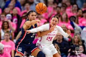 Creighton Bluejays guard Molly Mogensen (21) tries to block a pass against UConn Huskies guard Azzi Fudd (35) in the second half during a college basketball game, Saturday, January 25, 2025, in Omaha, Nebraska. Photo by John S. Peterson.