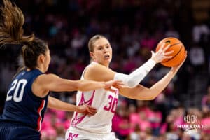 Creighton Bluejays guard Morgan Maly (30) keeps the ball away from UConn Huskies guard Kaitlyn Chen (20) in the first half during a college basketball game, Saturday, January 25, 2025, in Omaha, Nebraska. Photo by John S. Peterson.