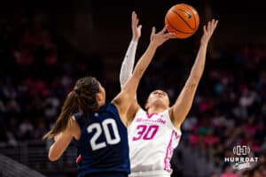 Creighton Bluejays guard Morgan Maly (30) and UConn Huskies guard Kaitlyn Chen (20) reach for a rebound in the third quarter during a college basketball game, Saturday, January 25, 2025, in Omaha, Nebraska. Photo by John S. Peterson.