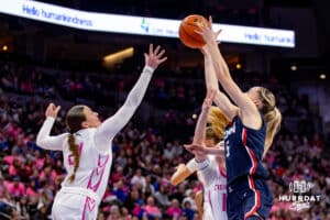 UConn Huskies guard Paige Bueckers (5) grabs the rebound against Creighton Bluejays guard Molly Mogensen (21) in the third quarter during a college basketball game, Saturday, January 25, 2025, in Omaha, Nebraska. Photo by John S. Peterson.