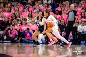Creighton Bluejays guard Molly Mogensen (21) dribbles the ball against UConn Huskies guard Ashlynn Shade (12) in the second quarter during a college basketball game, Saturday, January 25, 2025, in Omaha, Nebraska. Photo by John S. Peterson.