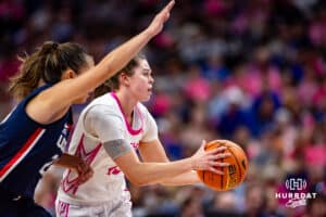 Creighton Bluejays guard Lauren Jensen (15) makes a pass against the UConn Huskies during a college basketball game, Saturday, January 25, 2025, in Omaha, Nebraska. Photo by John S. Peterson.