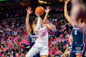 Creighton Bluejays guard Morgan Maly (30) drives to the basket for a layup against UConn Huskies guard Azzi Fudd (35) in the first quarter during a college basketball game, Saturday, January 25, 2025, in Omaha, Nebraska. Photo by John S. Peterson.