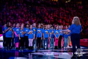 Kids from Rohwer Elementary singing the National Anthem before the Creighton Bluejays takes on the UConn Huskies during a college basketball game, Saturday, January 25, 2025, in Omaha, Nebraska. Photo by John S. Peterson.