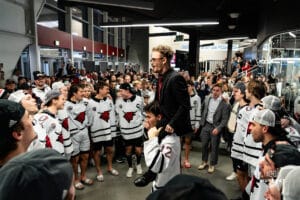 Omaha Maverick fans and team gather after the game to sing and get autographs after the hockey match at Baxter Arena on Saturday, January 25, 2025, in Omaha, Nebraska. Photo by Collin Stilen.
