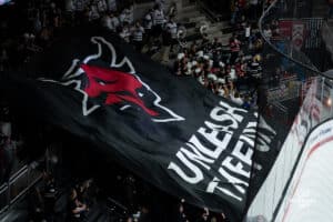 Omaha Mavericks 'Unleash The Fury' flag flies to start the third period during a hockey match at Baxter Arena on Saturday, January 25, 2025, in Omaha, Nebraska. Photo by Collin Stilen.