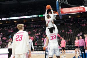 Creighton Bluejays Steven Ashworth dunks with the help of Fredrick King before a college basketball game against Seton Hall on January 25th, 2025 in Omaha Nebraska. Photo by Brandon Tiedemann.