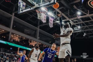 Omaha Maverick Ja'Sean Glover lofts it up during a basketball game at Baxter Arena on January 23rd, 2025 in Omaha Nebraska. Photo by Collin Stilen.