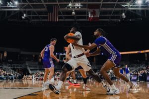 Omaha Maverick JJ White battles to the hoop during a basketball game at Baxter Arena on January 23rd, 2025 in Omaha Nebraska. Photo by Collin Stilen.