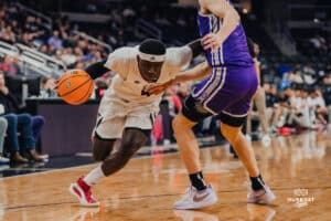 Omaha Maverick Ja'Sean Glover drives to the hoop during a basketball game at Baxter Arena on January 23rd, 2025 in Omaha Nebraska. Photo by Collin Stilen.