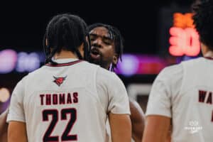 Omaha Maverick Isaac Ondekane celebrating during a basketball game at Baxter Arena on January 23rd, 2025 in Omaha Nebraska. Photo by Collin Stilen.