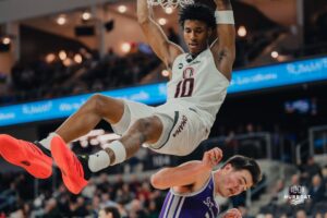 Omaha Maverick Marquel Sutton looking down on his opponent during a basketball game at Baxter Arena on January 23rd, 2025 in Omaha Nebraska. Photo by Collin Stilen.