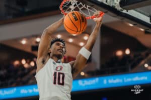 Omaha Maverick Marquel Sutton gets a dunk off of a drive during a basketball game at Baxter Arena on January 23rd, 2025 in Omaha Nebraska. Photo by Collin Stilen.