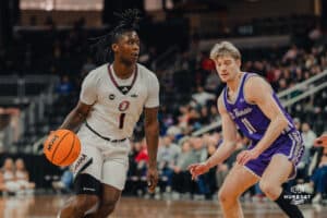 Omaha Maverick JJ White looks to drive the ball during a basketball game at Baxter Arena on January 23rd, 2025 in Omaha Nebraska. Photo by Collin Stilen.