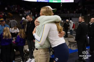 San Diego Mojo Leyla Blackwell (26) receives a hug from Nebraska assistant coach Jaylen Reyes after the match against the Omaha Supernovas, Sunday, January 19, 2025, in Omaha, Nebraska. Photo by John S. Peterson.