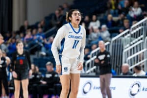 Creighton Bluejay Kiani Lockett celebrates after a made three pointer during a basketball game at Sokol Arena on Saturday, January 18, 2025, in Omaha, Nebraska. Photo by Collin Stilen.