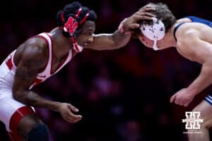 Nebraska's Antrell Taylor starts to tie up with Penn State's Tyler Kasak at 157lbs during a college wrestling match, Friday, January 17, 2025, in Lincoln, Nebraska. Photo by John S. Peterson.