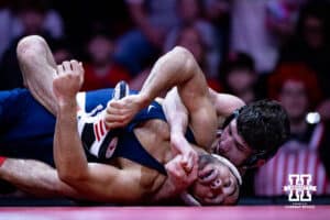 Nebraska's Ridge Lovett takes on Penn State's Shayne Van Ness at 149lbs during a college wrestling match, Friday, January 17, 2025, in Lincoln, Nebraska. Photo by John S. Peterson.