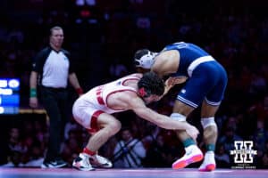 Nebraska's Ridge Lovett goes for a leg Penn State's Shayne Van Ness at 149lbs during a college wrestling match, Friday, January 17, 2025, in Lincoln, Nebraska. Photo by John S. Peterson.
