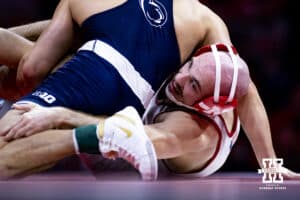 Nebraska's Brock Hardy reaches for a leg against Penn State's Beau Barlett at 141lbs during a college wrestling match, Friday, January 17, 2025, in Lincoln, Nebraska. Photo by John S. Peterson.