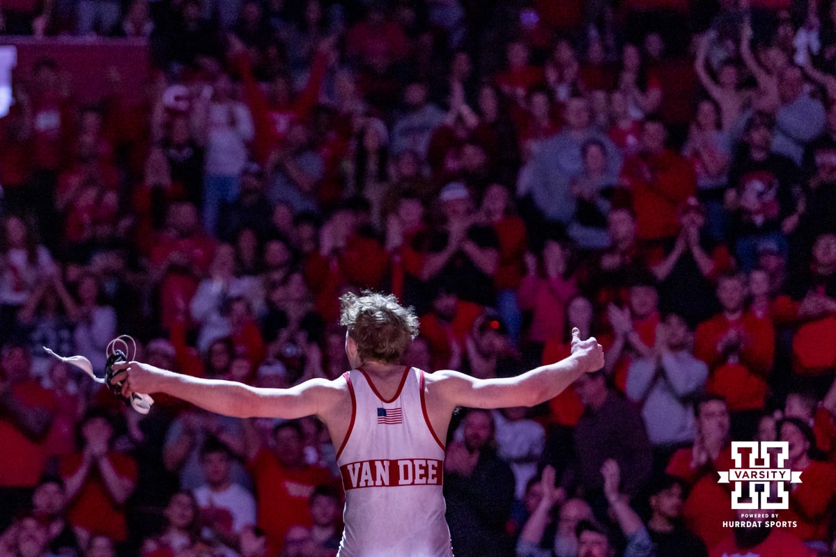 Nebraska's Cacob Van Dee celebrates the win against Penn State's Braeden Davis at 133lbs during a college wrestling match, Friday, January 17, 2025, in Lincoln, Nebraska. Photo by John S. Peterson