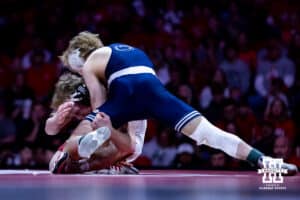 Nebraska's Cacob Van Dee goes for the leg against Penn State's Braeden Davis at 133lbs during a college wrestling match, Friday, January 17, 2025, in Lincoln, Nebraska. Photo by John S. Peterson