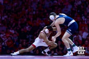 Nebraska's Caleb Smit shoots for a leg agaisnt Penn State's Luke Lilledahl at 125lbs during a college wrestling match, Friday, January 17, 2025, in Lincoln, Nebraska. Photo by John S. Peterson