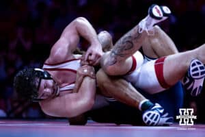 Nebraska's Harley Andrews tries to break the grip against Penn State's Greg Kerkvliet at 285lbs during a college wrestling match, Friday, January 17, 2025, in Lincoln, Nebraska. Photo by John S. Peterson.