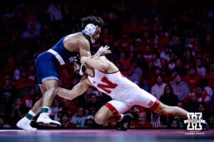 Nebraska's Silas Allred shoots for a leg against Penn State's Carter Starocci at 184lbs during a college wrestling match, Friday, January 17, 2025, in Lincoln, Nebraska. Photo by John S. Peterson.