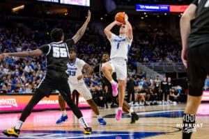 Creighton Bluejays guard Steven Ashworth (1) makes a jumpshot against Providence Friars forward Oswin Erhunmwunse (55) in the second half during a college basketball game, Tuesday, January 14, 2025, in Omaha, Nebraska. Photo by John S. Peterson.