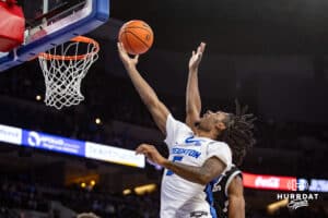 Creighton Bluejays guard Jamiya Neal (5) makes a layup against the Providence Friars in the second half during a college basketball game, Tuesday, January 14, 2025, in Omaha, Nebraska. Photo by John S. Peterson.