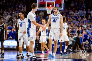 Creighton Bluejays center Ryan Kalkbrenner (11) gives Isaac Traudt five in the second half during a college basketball game, Tuesday, January 14, 2025, in Omaha, Nebraska. Photo by John S. Peterson.