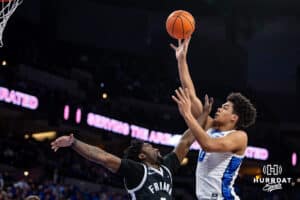 Creighton Bluejays forward Jasen Green (0) makes a layup against Providence Friars guard Bensley Joseph (7) in the second half during a college basketball game, Tuesday, January 14, 2025, in Omaha, Nebraska. Photo by John S. Peterson.