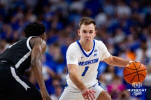 Creighton Bluejays guard Steven Ashworth (1) drives the lane against Providence Friars guard Jayden Pierre (1) in the second half during a college basketball game, Tuesday, January 14, 2025, in Omaha, Nebraska. Photo by John S. Peterson.