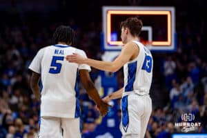 Creighton Bluejays forward Mason Miller (13) pats Jamiya Neal on the back after making a basket at the end of the first half against the Providence Friars during a college basketball game, Tuesday, January 14, 2025, in Omaha, Nebraska. Photo by John S. Peterson.