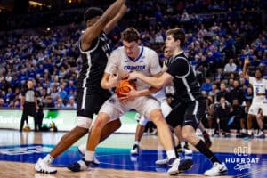 Creighton Bluejays center Ryan Kalkbrenner (11) battles to protect the ball against the Providence Friars in the first half during a college basketball game, Tuesday, January 14, 2025, in Omaha, Nebraska. Photo by John S. Peterson.