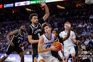 Creighton Bluejays forward Mason Miller (13) fights for layup against Providence Friars guard Jabri Abdur-Rahim (3) in the first half during a college basketball game, Tuesday, January 14, 2025, in Omaha, Nebraska. Photo by John S. Peterson.
